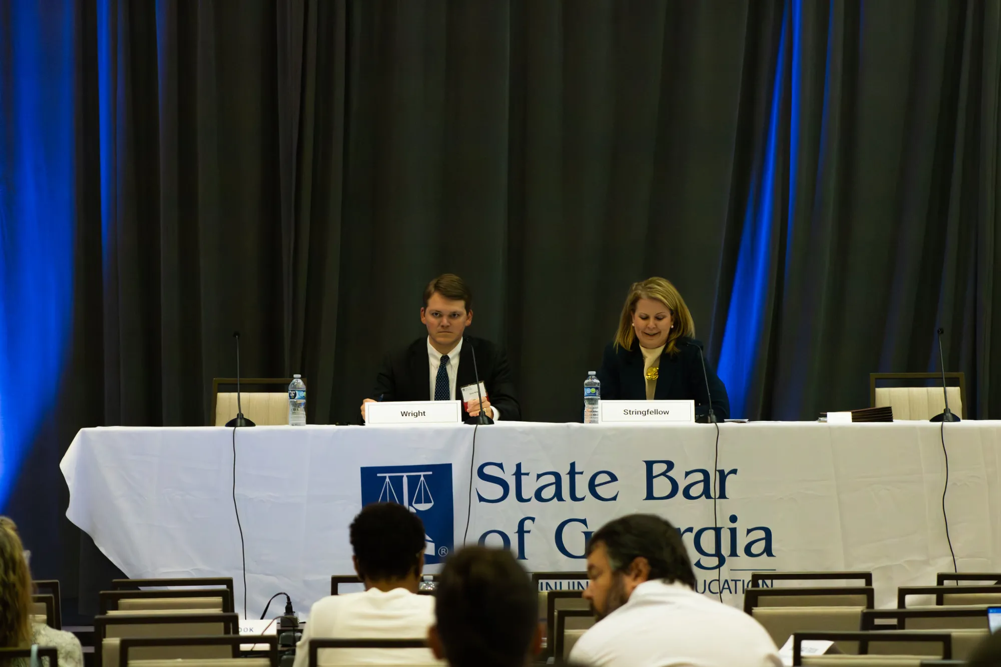 Panelists seated at a conference table with "State Bar of Georgia" banner.